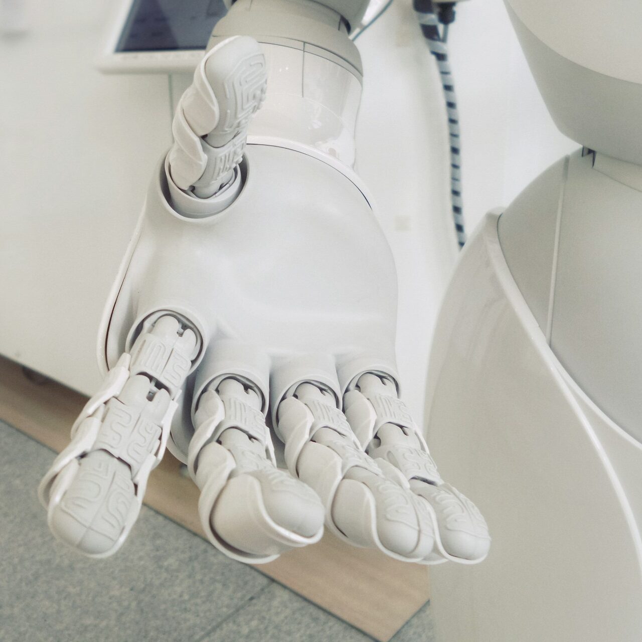 closeup photo of white robot arm